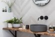 Create an organized spa-like bathroom with simplehuman bath tools .