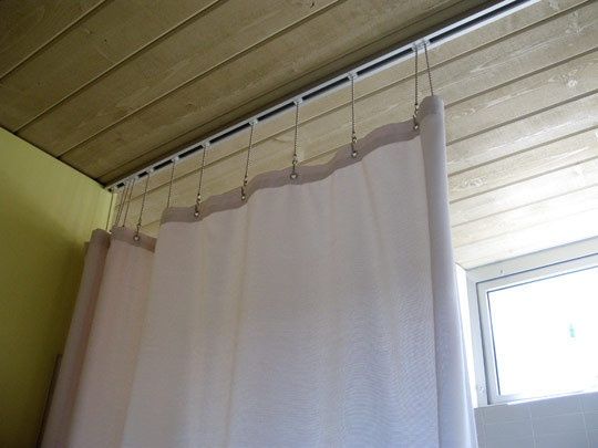 trax shower curtain hanging system. saw on houzz but not able to .
