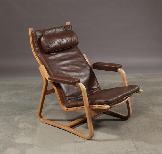 Great danish brown leather reclining armchair/ easychair/ lounge .