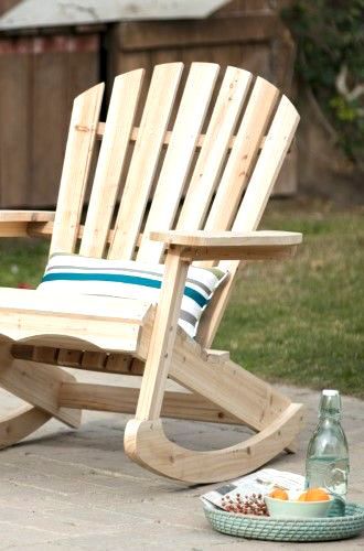 Natural wood Adirondack rocking chair, garden furniture idea .