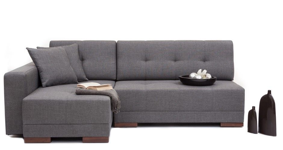 A wrap-around couch that converts into a double bed with a single .