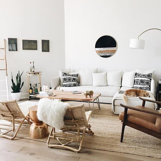 A mix of mid-century modern, bohemian, and industrial interior .